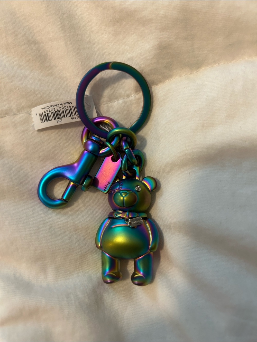 Coach oilslick Iridescent Rainbow Bear Keychain.